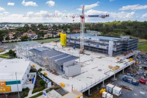 Construction site drone video of medical centre development at Helensvale